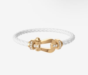 Bracelet Fred Blanc et doré